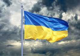 Ukraine flag with incoming storm
