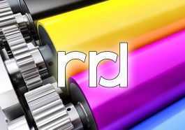RRD logo overlaid on a color printing press