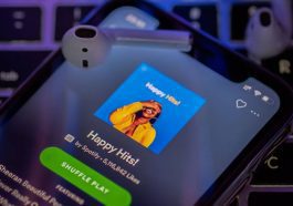 Spotify botão play shuffle álbuns