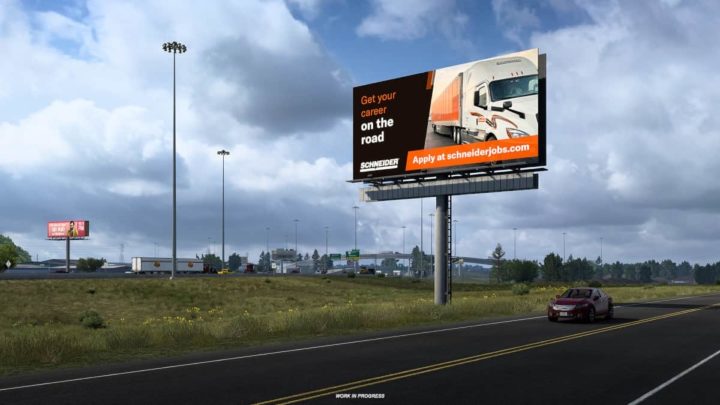 Jeu vidéo American Truck Simulator avec des panneaux d'affichage recrutant pour Schneider National