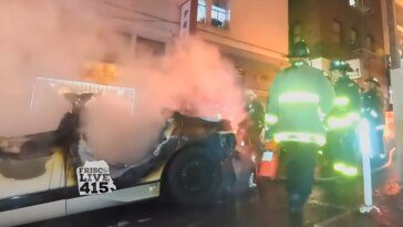 Waymo self-driving taxi vandalized and set ablaze by San Francisco crowd