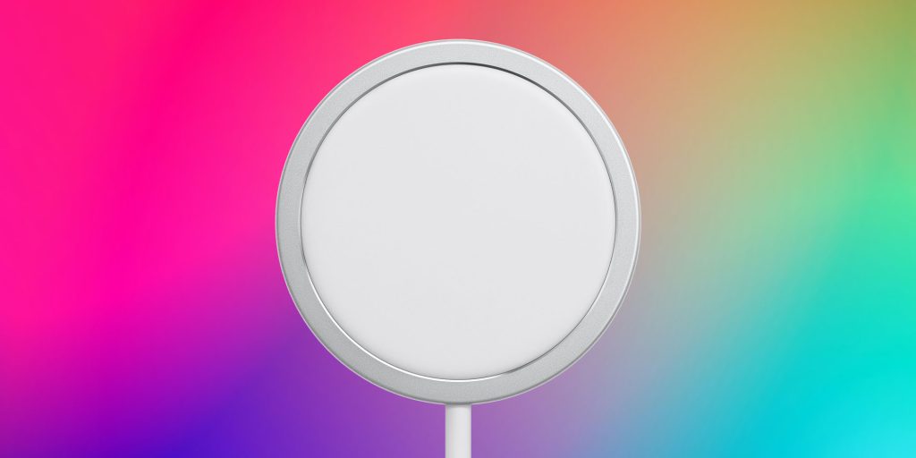 EU confirme qu'Apple peut fabriquer un iPhone sans port USB-C | Chargeur MagSafe sur fond coloré