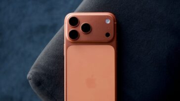 Two reasons helped Apple hit record iPhone sales, and they’re both orange